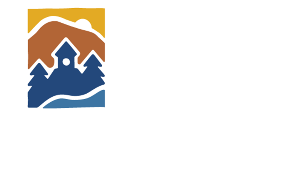 Benton County logo is drawing of mountain with sun, a building with a tree to each side and a swath of land below.